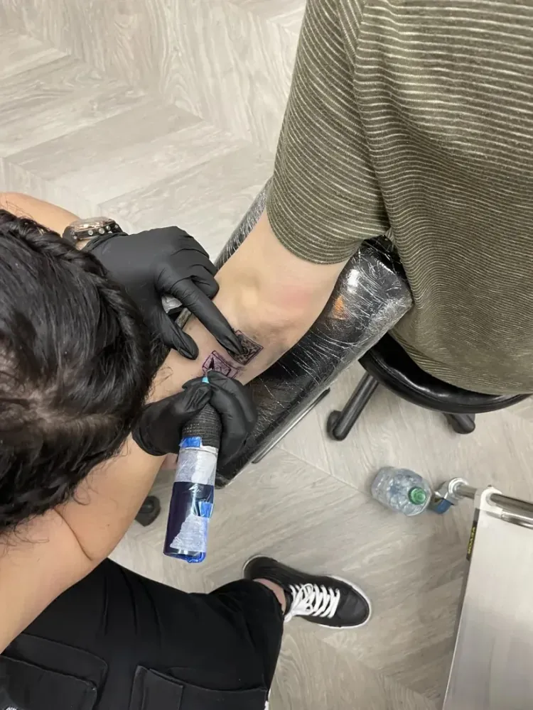 Fine line single-needle tattoo work